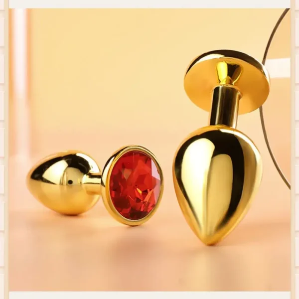 PLUG INOX VÀNG CHUÔI ĐÍNH ĐÁ ĐỎ